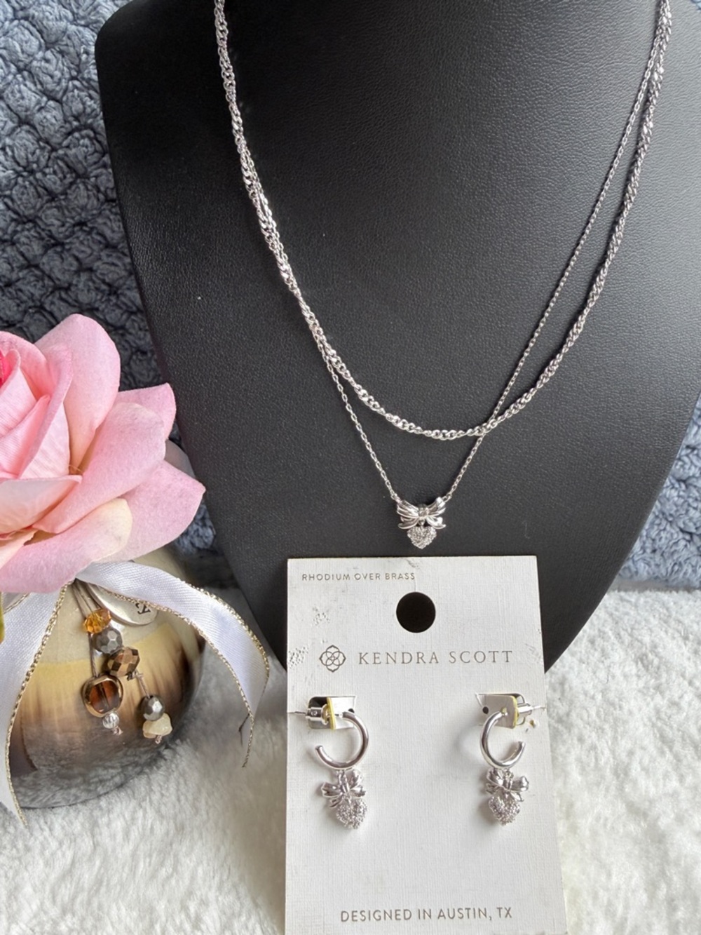 Bow Multi-Strand
Necklace & Belle Cubic Zirconia
Bow Huggie Hoop Silver Silver